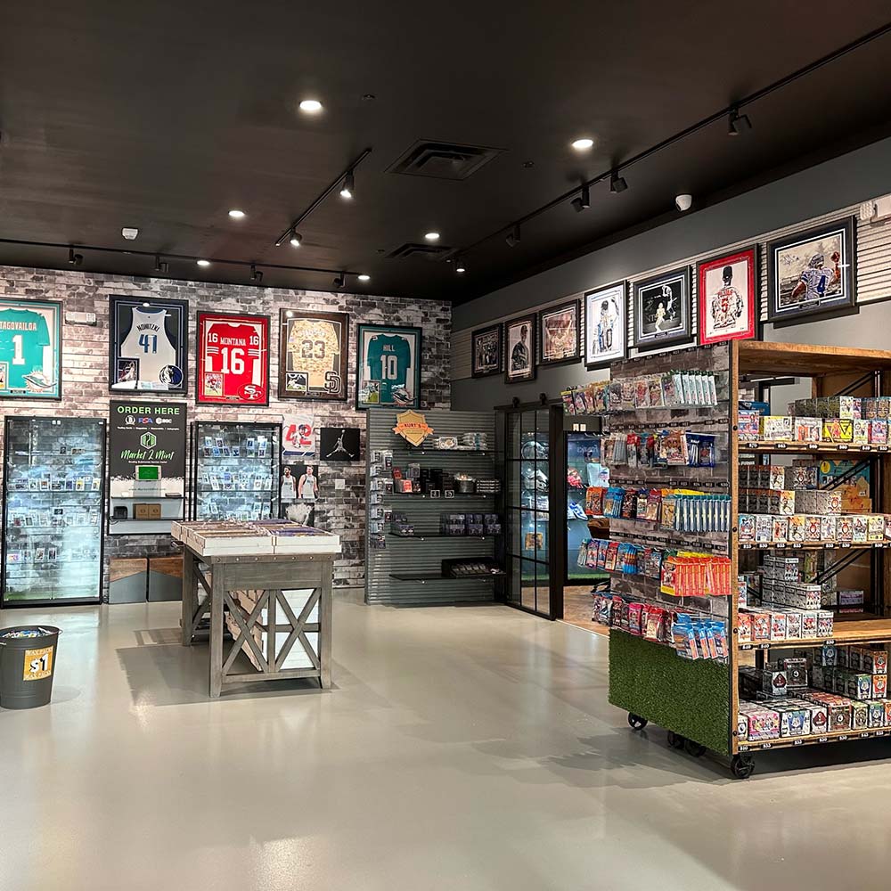 Collectors browsing sports cards at a show